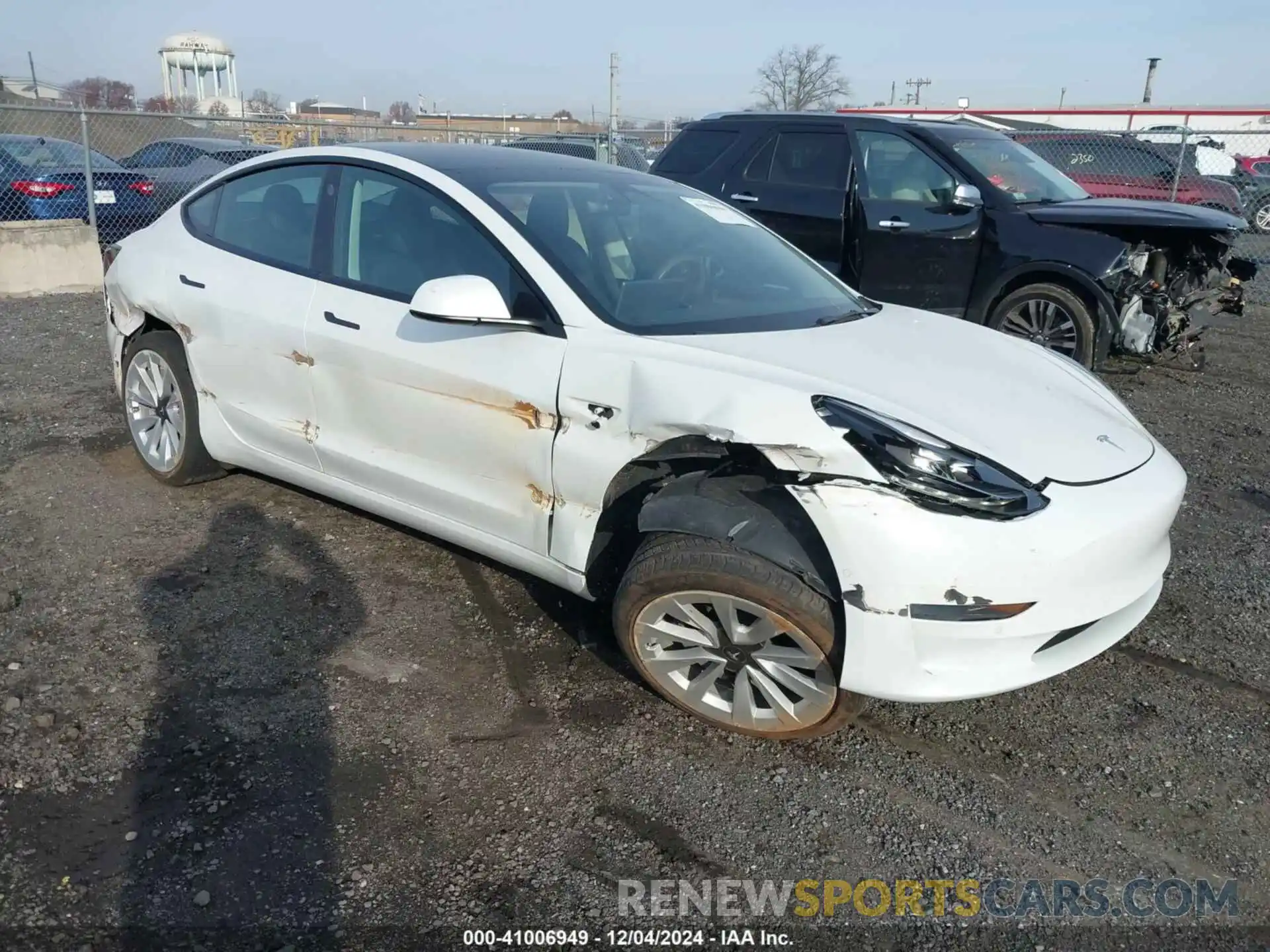 1 Photograph of a damaged car 5YJ3E1EB0NF208516 TESLA MODEL 3 2022