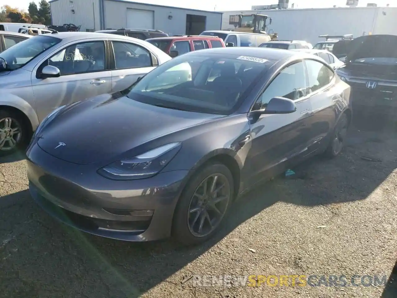 1 Photograph of a damaged car 5YJ3E1EB0NF211464 TESLA MODEL 3 2022