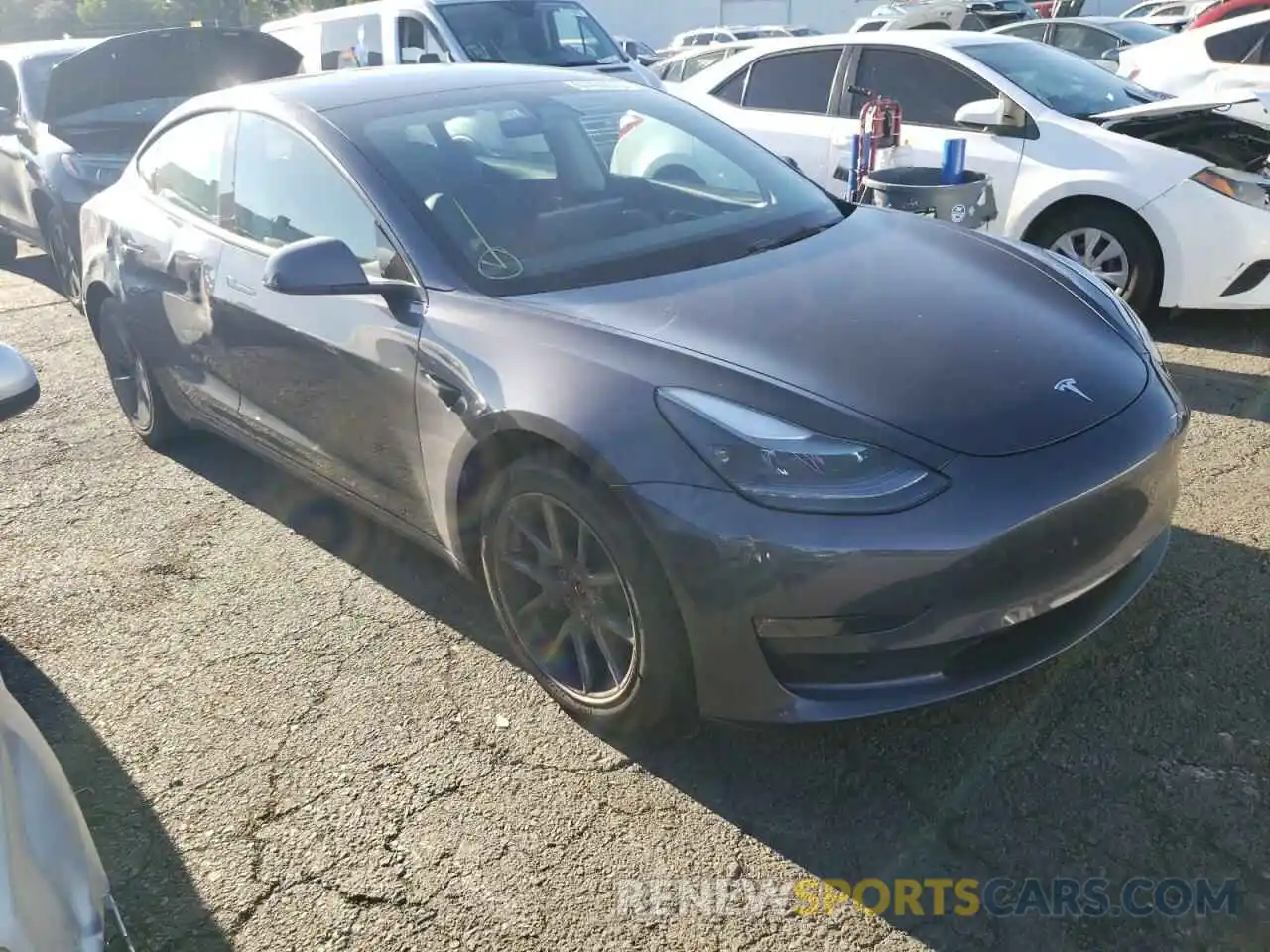 4 Photograph of a damaged car 5YJ3E1EB0NF211464 TESLA MODEL 3 2022