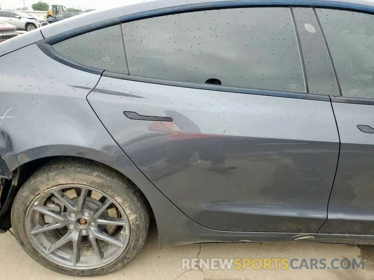 10 Photograph of a damaged car 5YJ3E1EB0NF244593 TESLA MODEL 3 2022