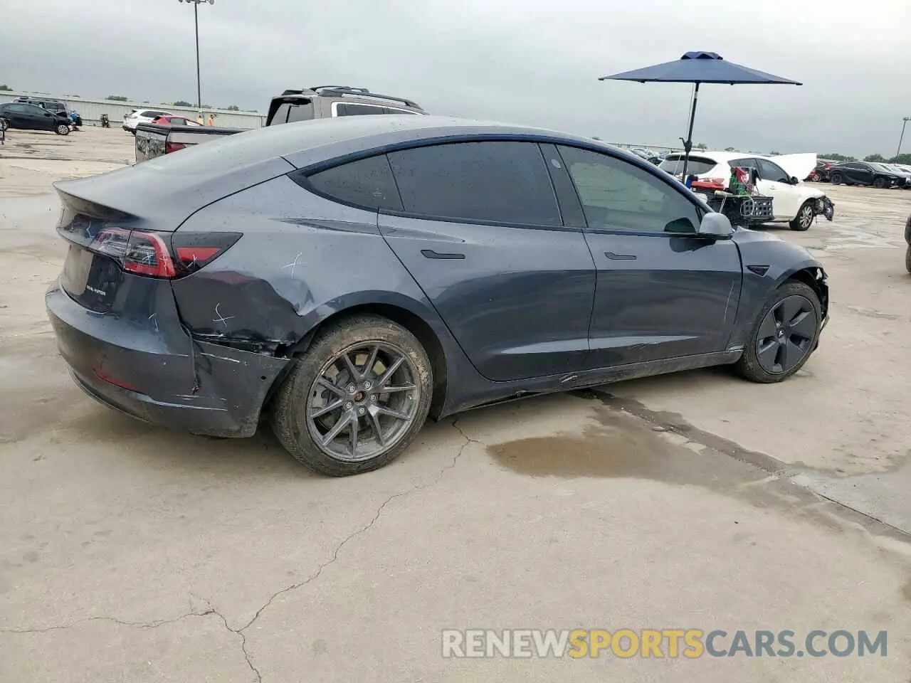 3 Photograph of a damaged car 5YJ3E1EB0NF244593 TESLA MODEL 3 2022
