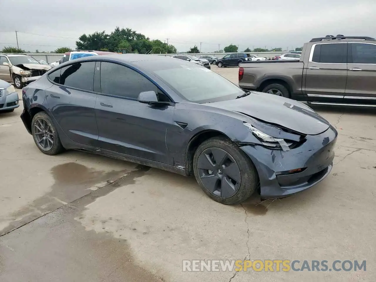 4 Photograph of a damaged car 5YJ3E1EB0NF244593 TESLA MODEL 3 2022