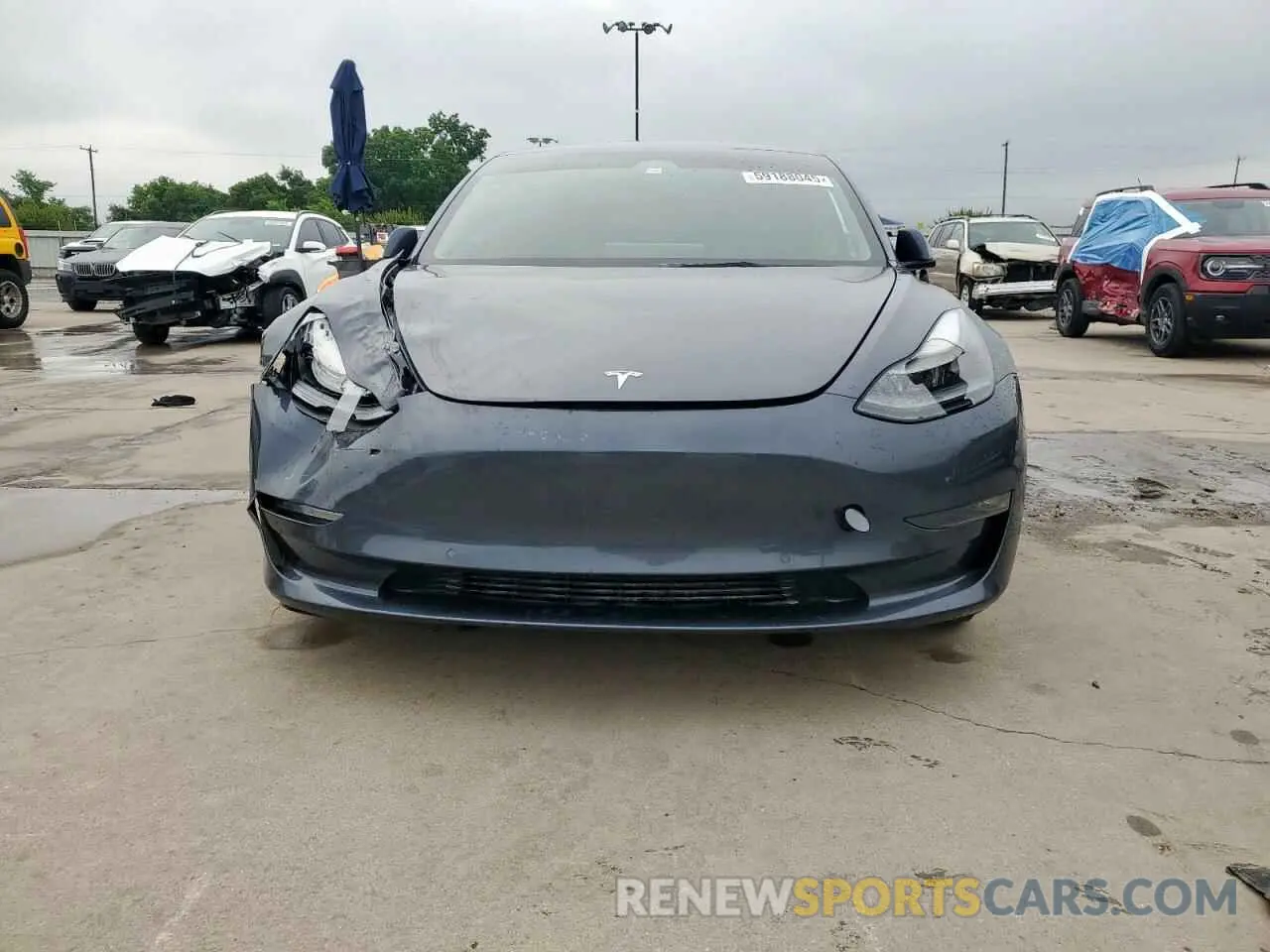 5 Photograph of a damaged car 5YJ3E1EB0NF244593 TESLA MODEL 3 2022