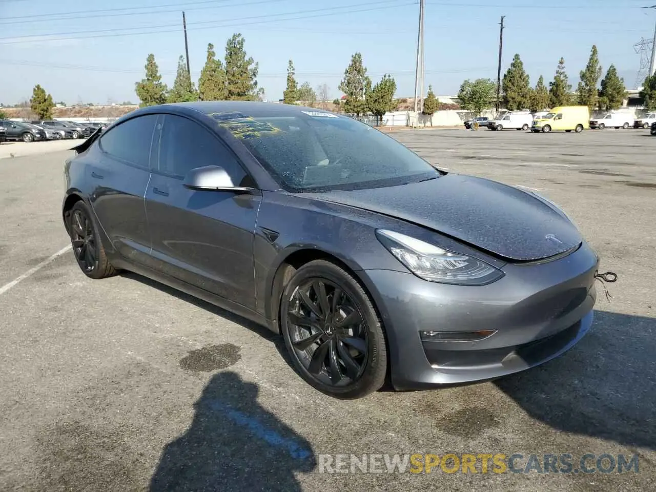 4 Photograph of a damaged car 5YJ3E1EB0NF261314 TESLA MODEL 3 2022