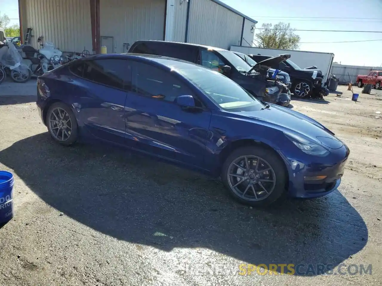 4 Photograph of a damaged car 5YJ3E1EB0NF262057 TESLA MODEL 3 2022