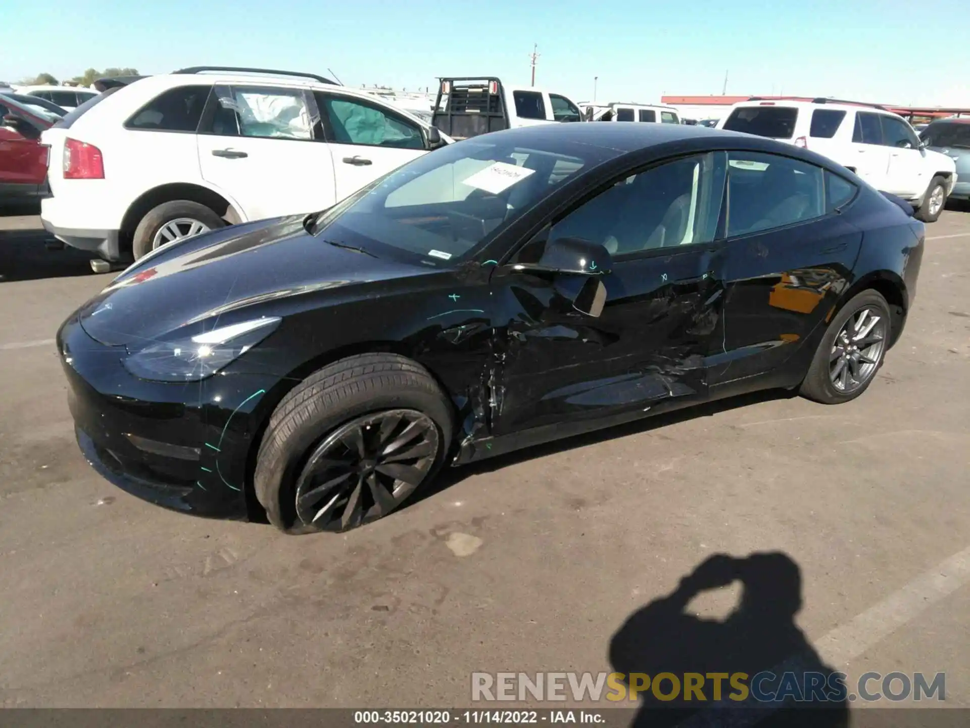 2 Photograph of a damaged car 5YJ3E1EB0NF266075 TESLA MODEL 3 2022