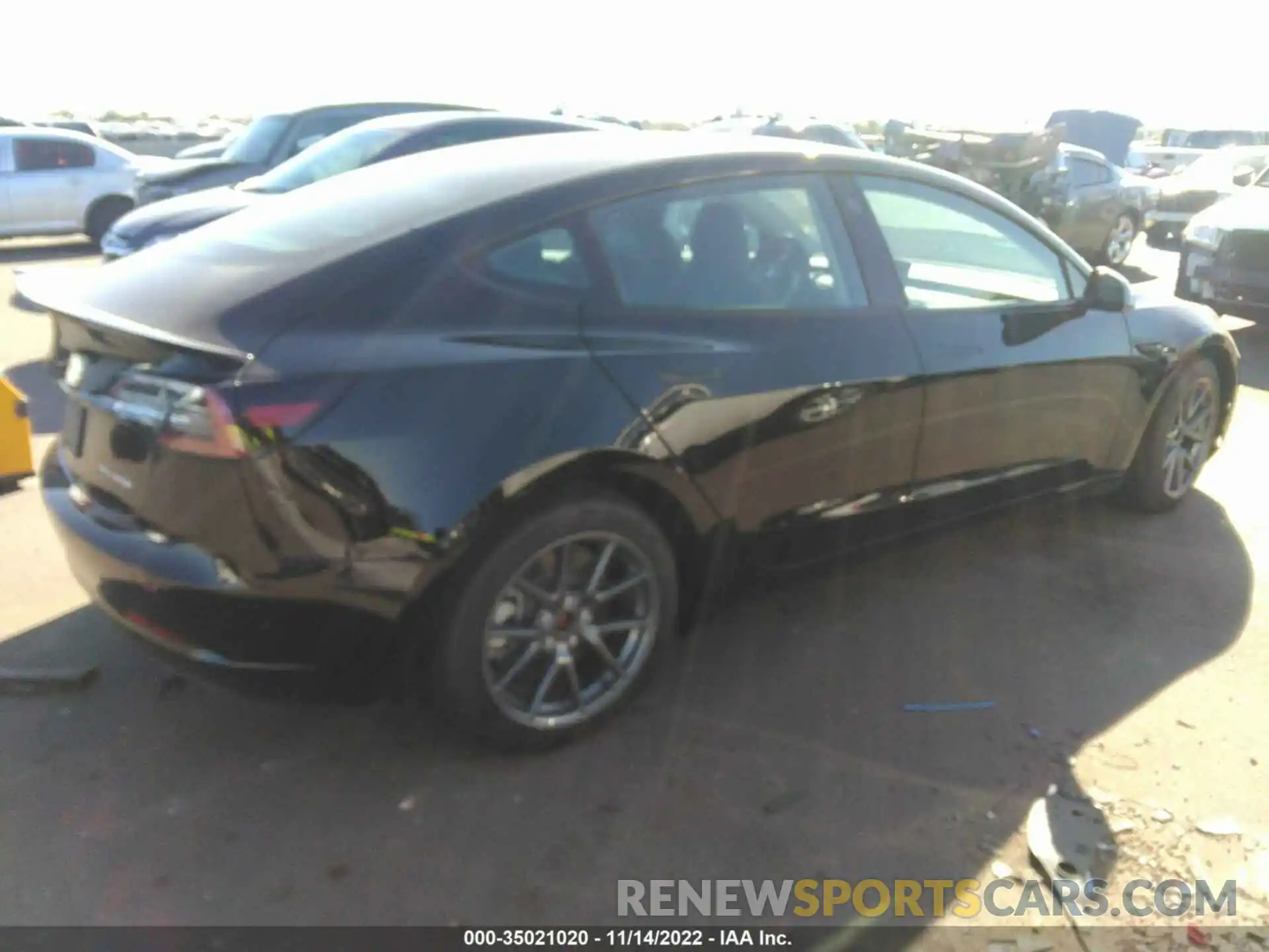 4 Photograph of a damaged car 5YJ3E1EB0NF266075 TESLA MODEL 3 2022