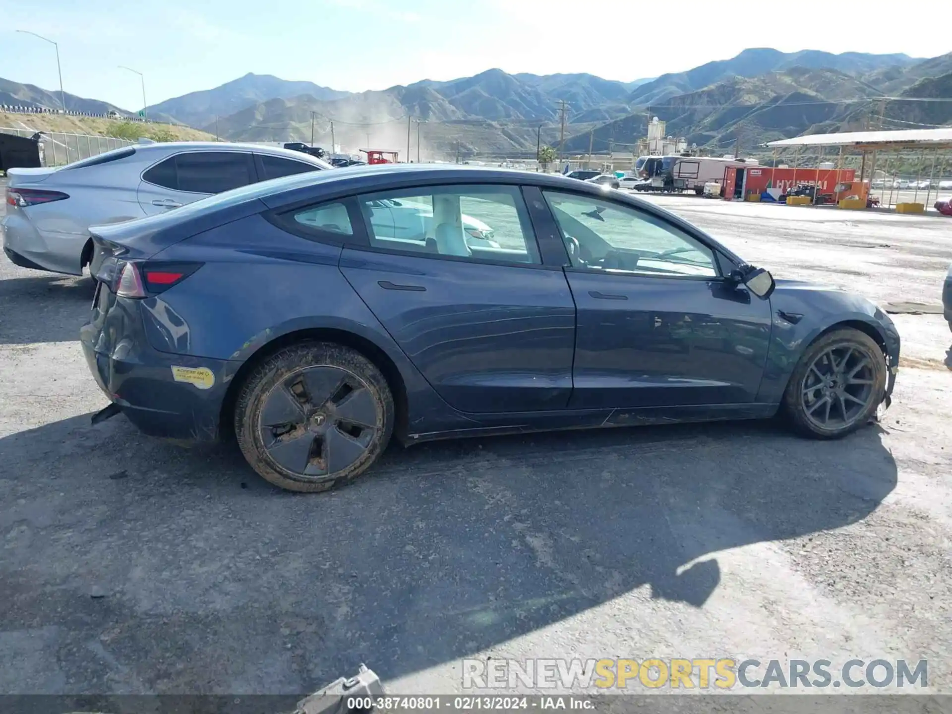 12 Photograph of a damaged car 5YJ3E1EB0NF277870 TESLA MODEL 3 2022