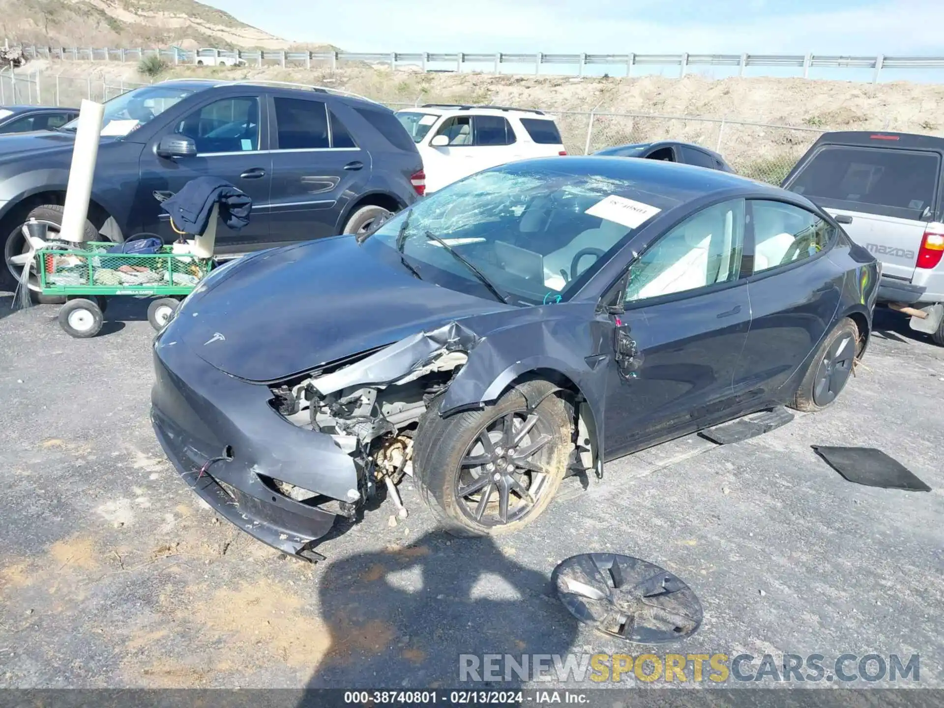 2 Photograph of a damaged car 5YJ3E1EB0NF277870 TESLA MODEL 3 2022