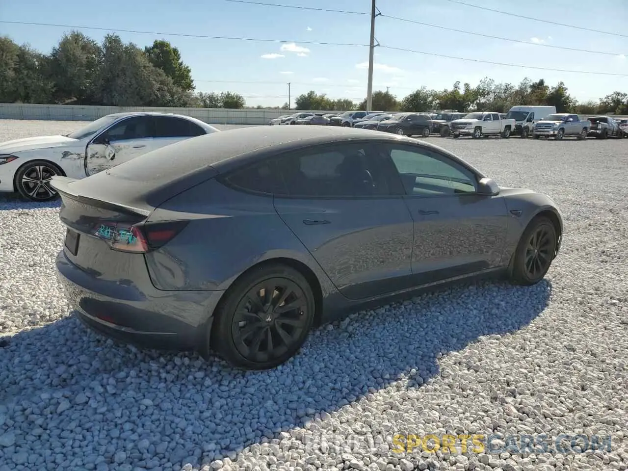 3 Photograph of a damaged car 5YJ3E1EB0NF300466 TESLA MODEL 3 2022