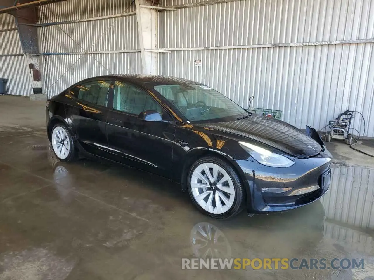 4 Photograph of a damaged car 5YJ3E1EB0NF304940 TESLA MODEL 3 2022