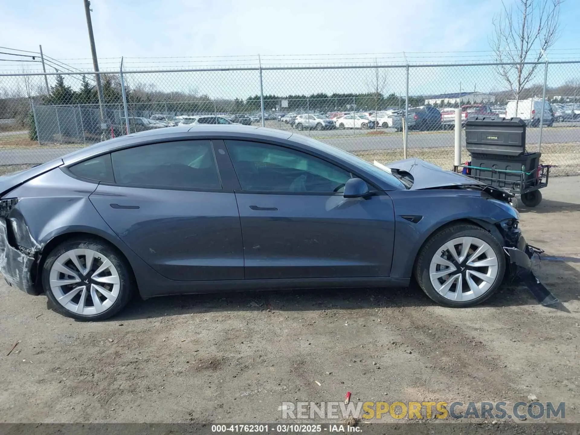 12 Photograph of a damaged car 5YJ3E1EB0NF314870 TESLA MODEL 3 2022