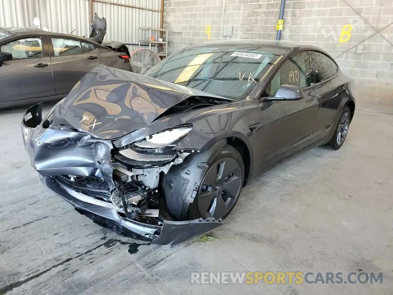 2 Photograph of a damaged car 5YJ3E1EB0NF333550 TESLA MODEL 3 2022