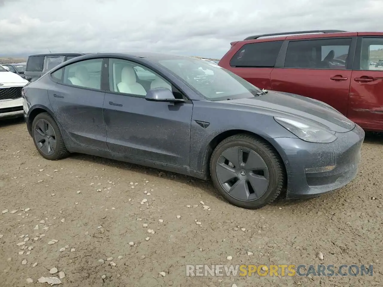 4 Photograph of a damaged car 5YJ3E1EB0NF352700 TESLA MODEL 3 2022