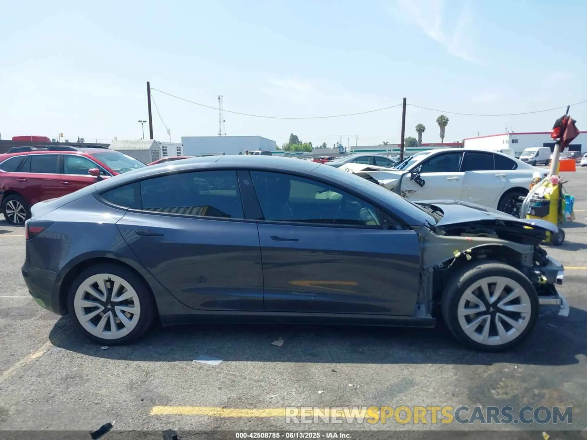 13 Photograph of a damaged car 5YJ3E1EB0NF358545 TESLA MODEL 3 2022