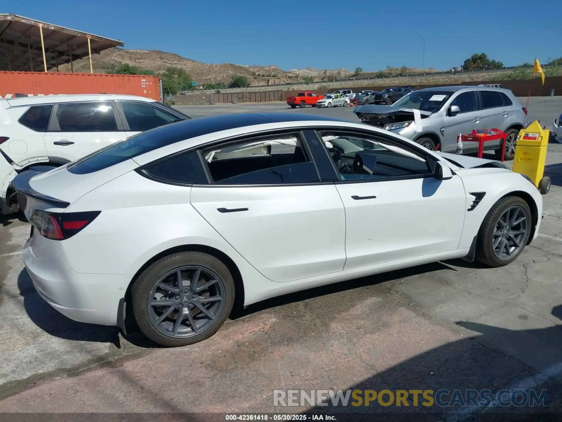 12 Photograph of a damaged car 5YJ3E1EB1NF106433 TESLA MODEL 3 2022