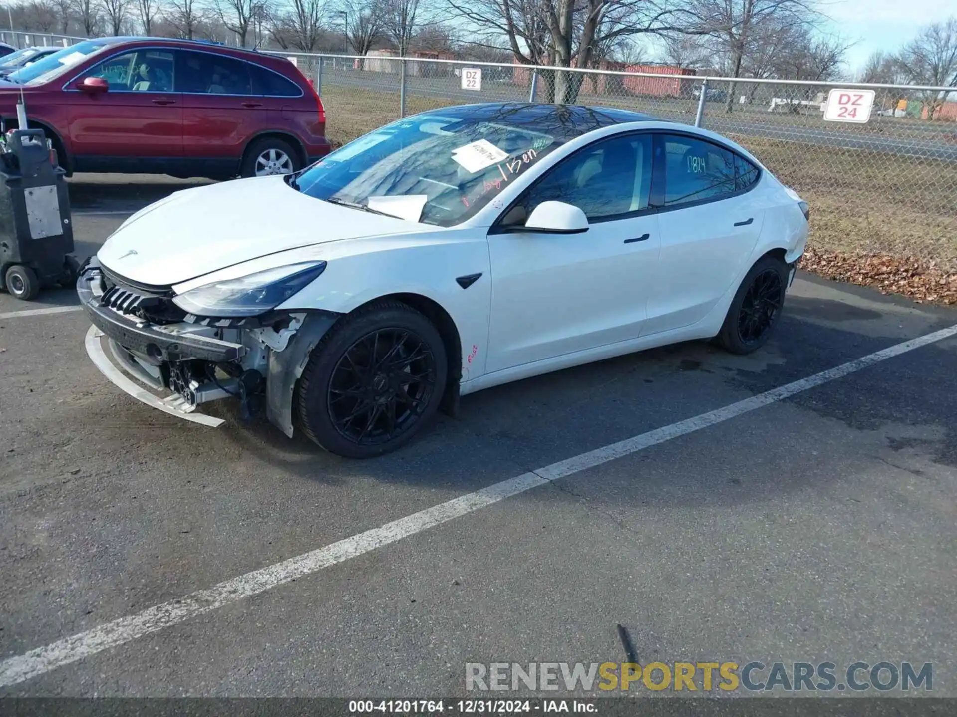 2 Photograph of a damaged car 5YJ3E1EB1NF107730 TESLA MODEL 3 2022