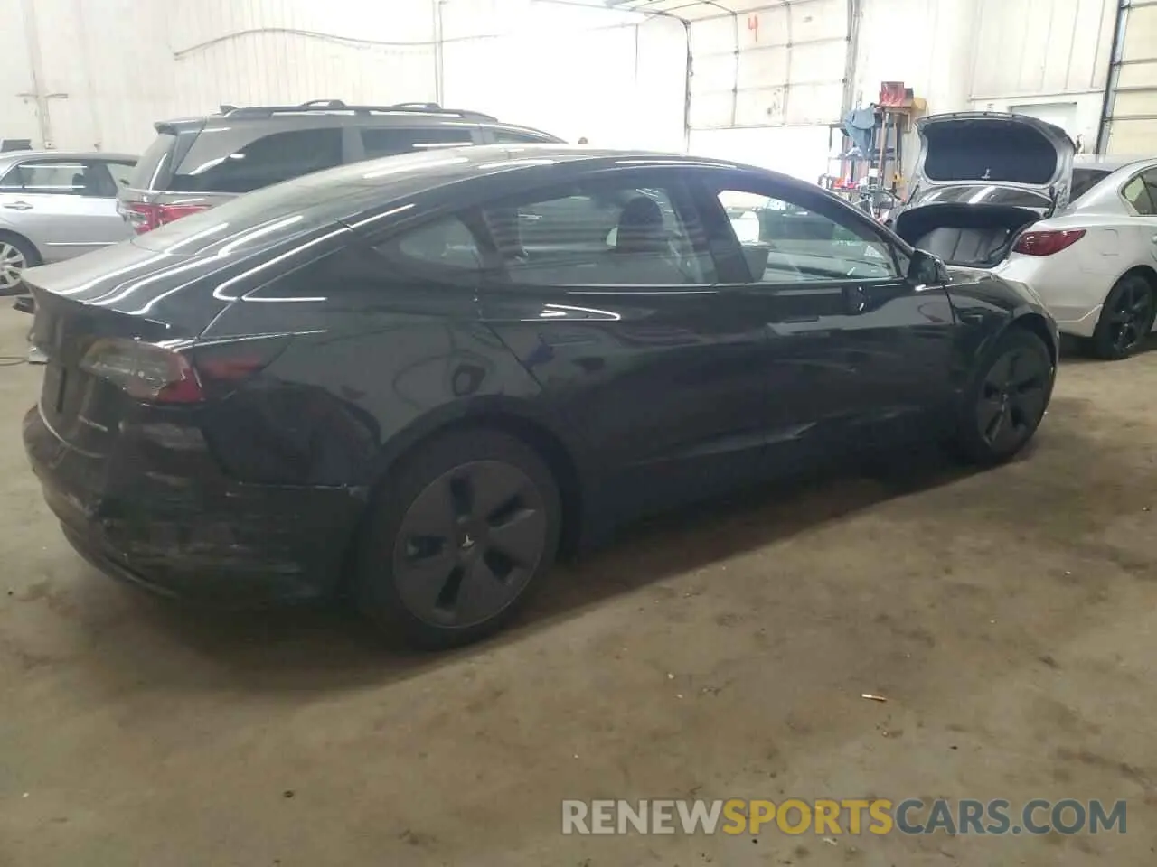 3 Photograph of a damaged car 5YJ3E1EB1NF110210 TESLA MODEL 3 2022