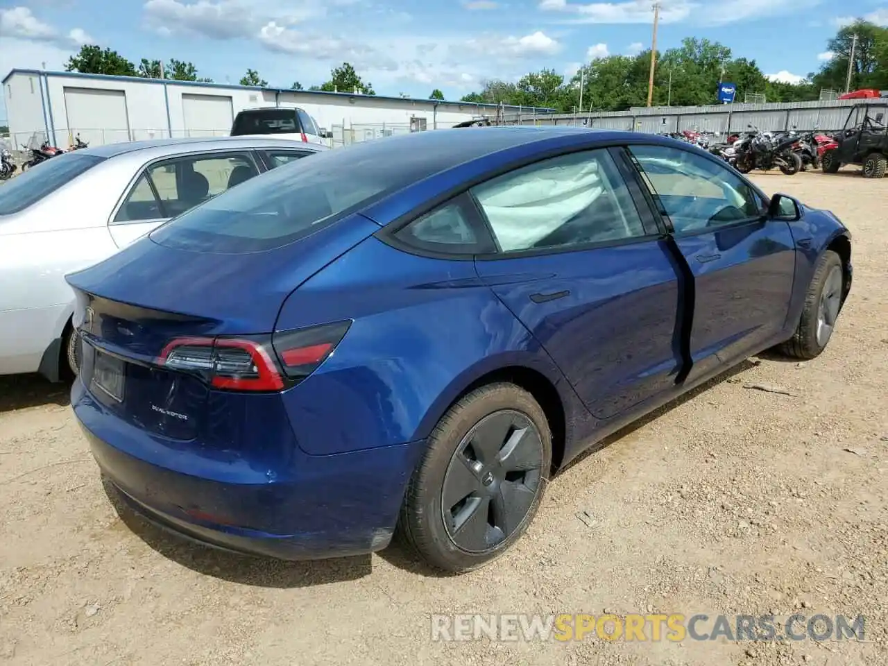 4 Photograph of a damaged car 5YJ3E1EB1NF114712 TESLA MODEL 3 2022