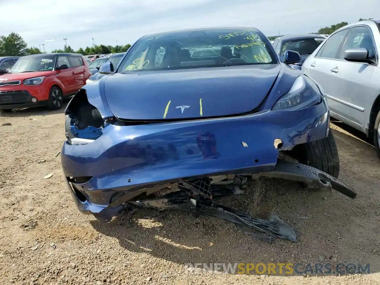 9 Photograph of a damaged car 5YJ3E1EB1NF114712 TESLA MODEL 3 2022