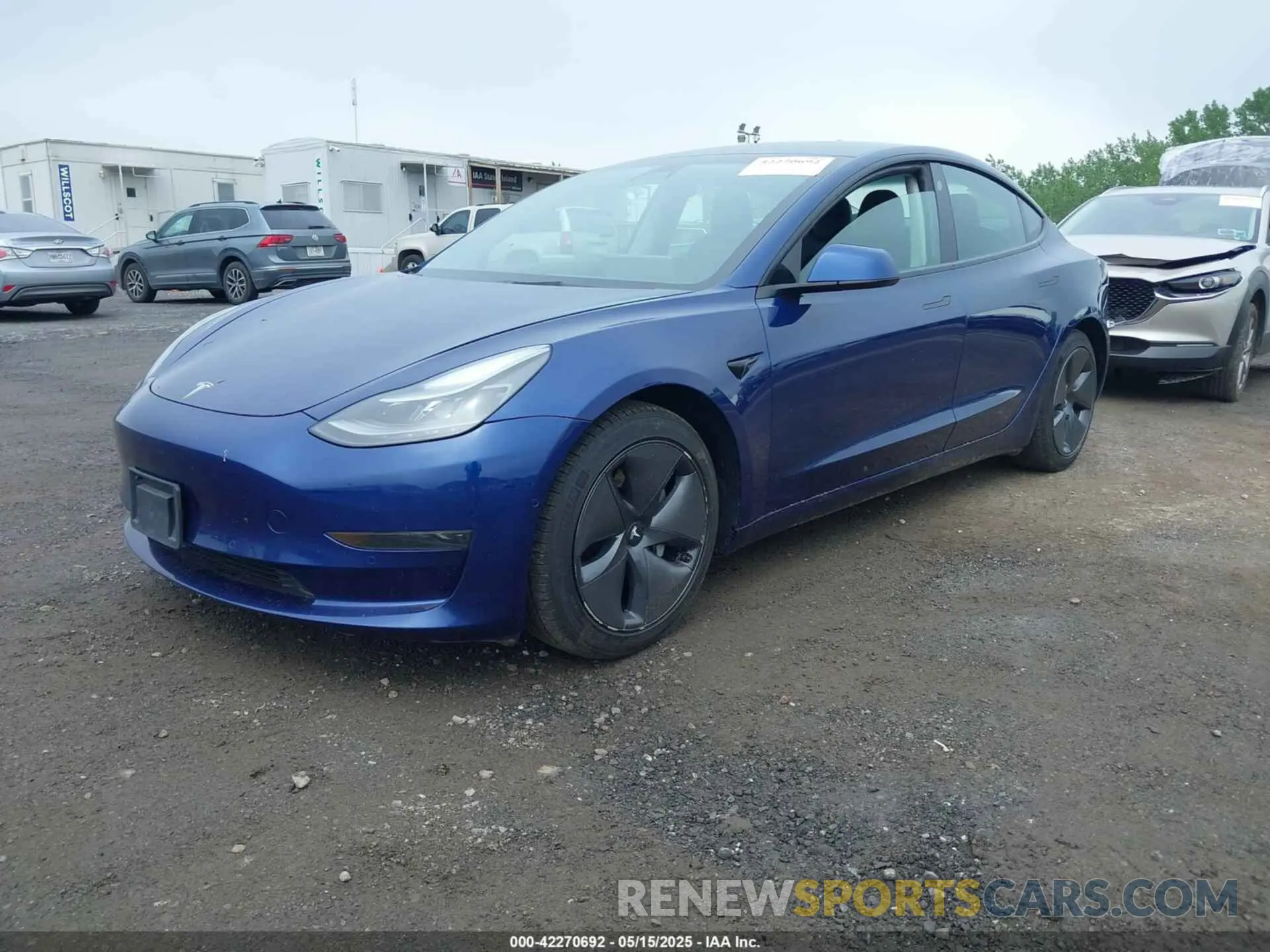 2 Photograph of a damaged car 5YJ3E1EB1NF115049 TESLA MODEL 3 2022