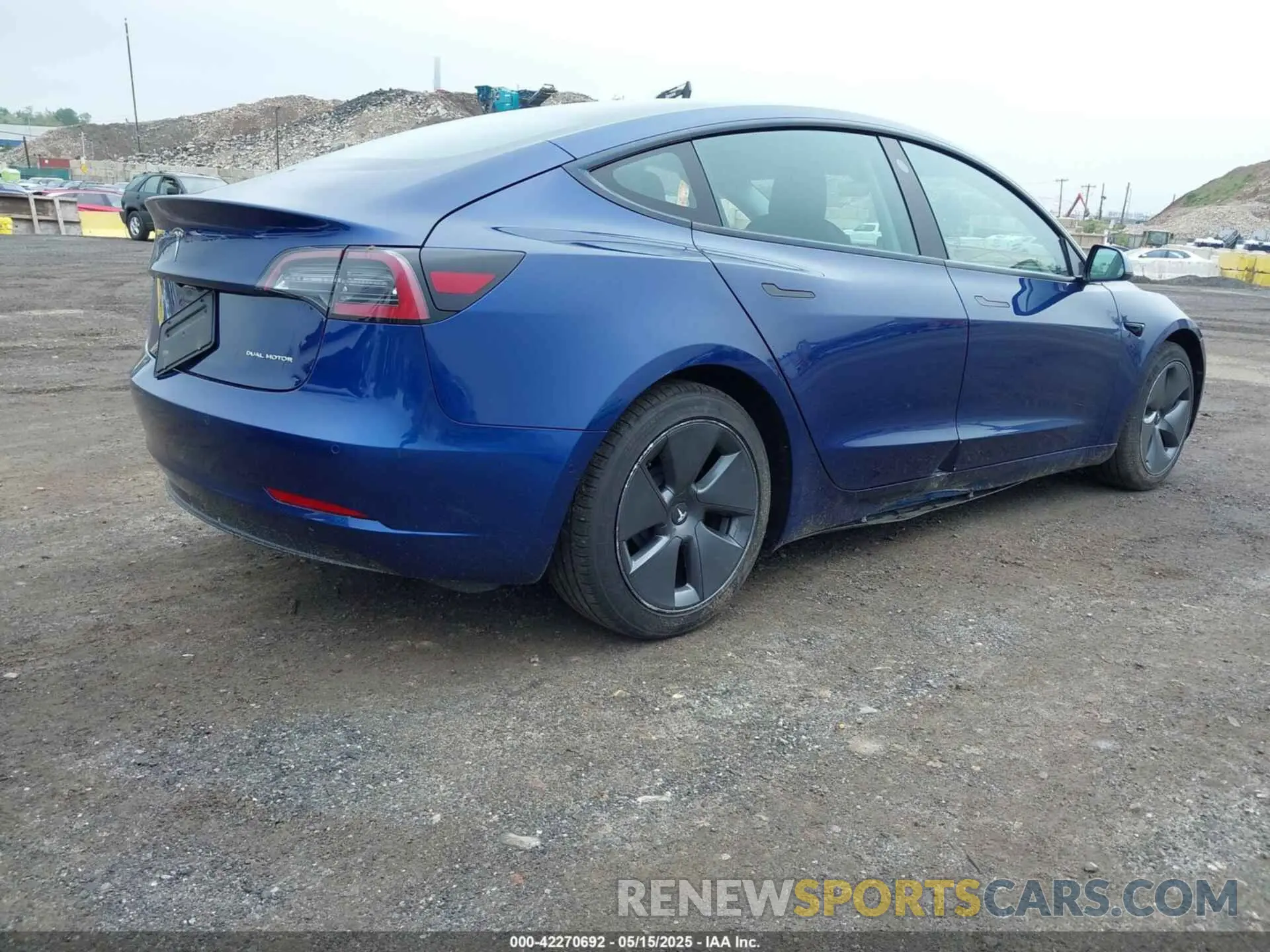 4 Photograph of a damaged car 5YJ3E1EB1NF115049 TESLA MODEL 3 2022