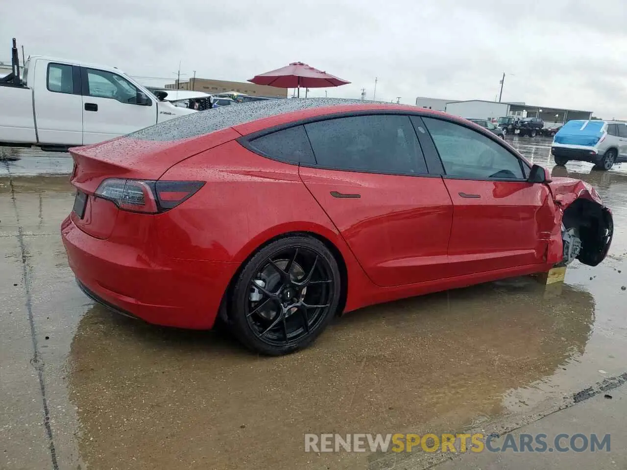 3 Photograph of a damaged car 5YJ3E1EB1NF115200 TESLA MODEL 3 2022