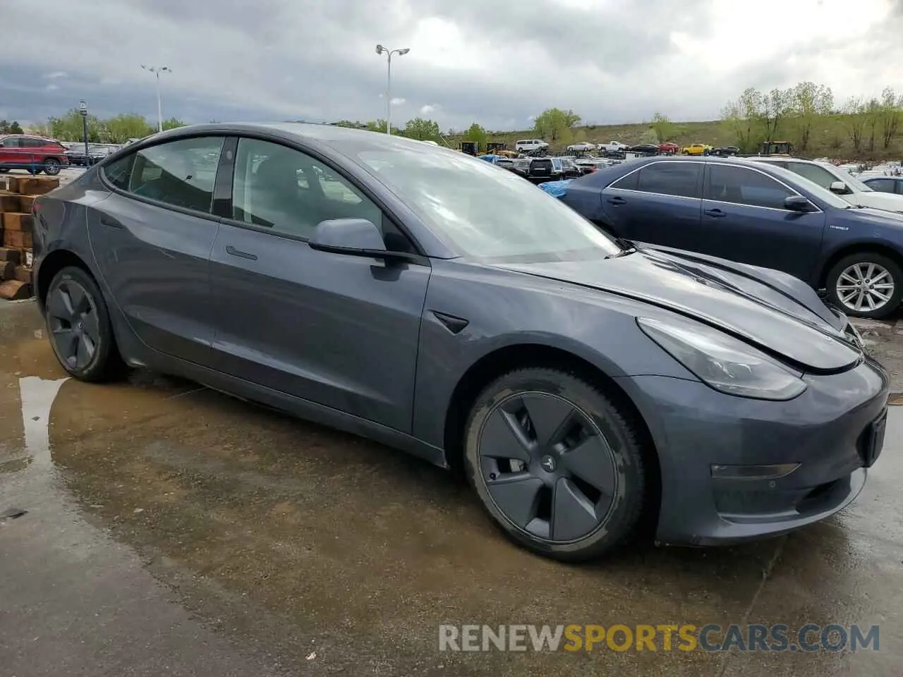 4 Photograph of a damaged car 5YJ3E1EB1NF120316 TESLA MODEL 3 2022