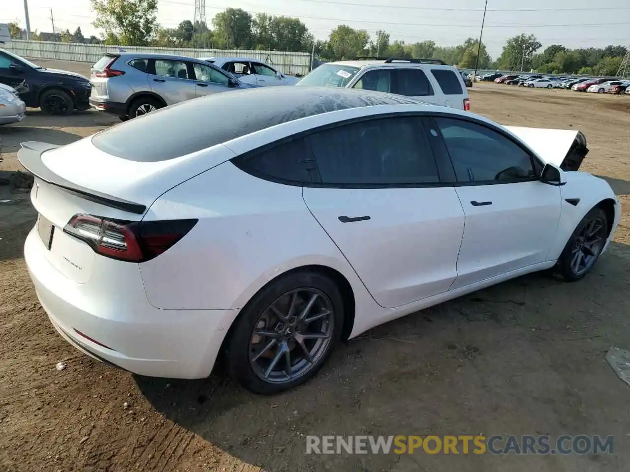 3 Photograph of a damaged car 5YJ3E1EB1NF120588 TESLA MODEL 3 2022