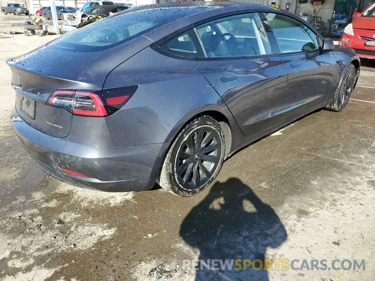 3 Photograph of a damaged car 5YJ3E1EB1NF125192 TESLA MODEL 3 2022
