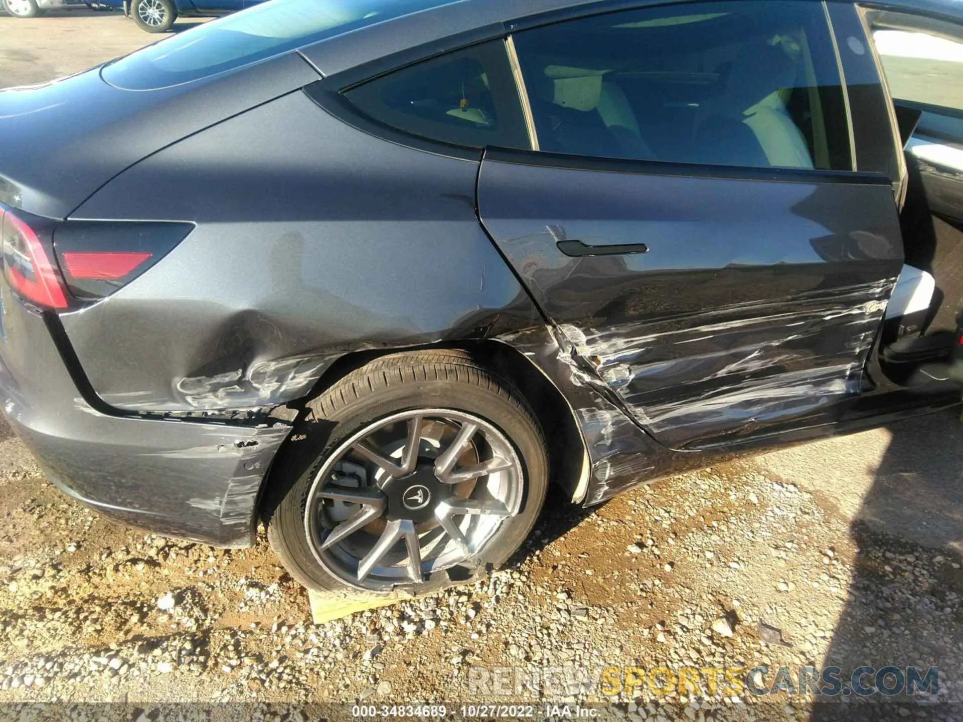 12 Photograph of a damaged car 5YJ3E1EB1NF125693 TESLA MODEL 3 2022
