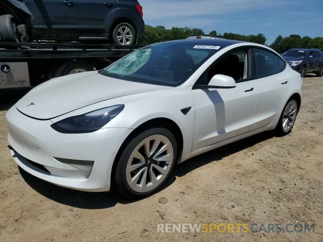 1 Photograph of a damaged car 5YJ3E1EB1NF127301 TESLA MODEL 3 2022