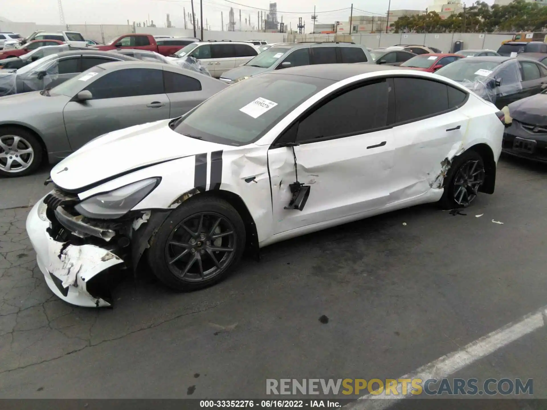 2 Photograph of a damaged car 5YJ3E1EB1NF132160 TESLA MODEL 3 2022