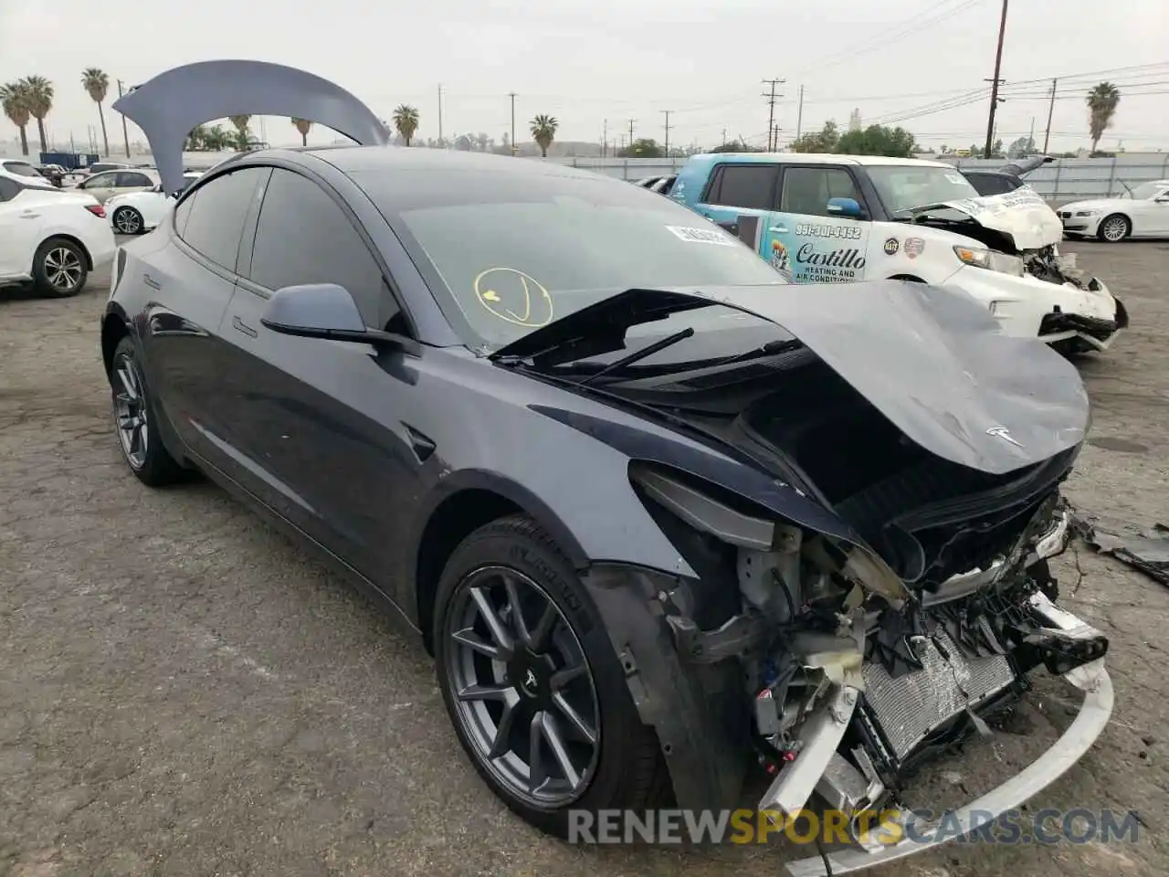 1 Photograph of a damaged car 5YJ3E1EB1NF137133 TESLA MODEL 3 2022