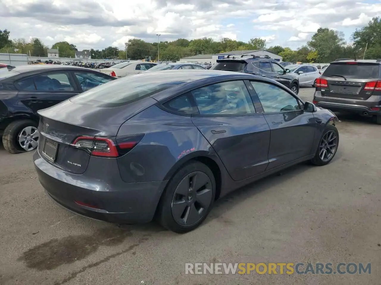 3 Photograph of a damaged car 5YJ3E1EB1NF175638 TESLA MODEL 3 2022
