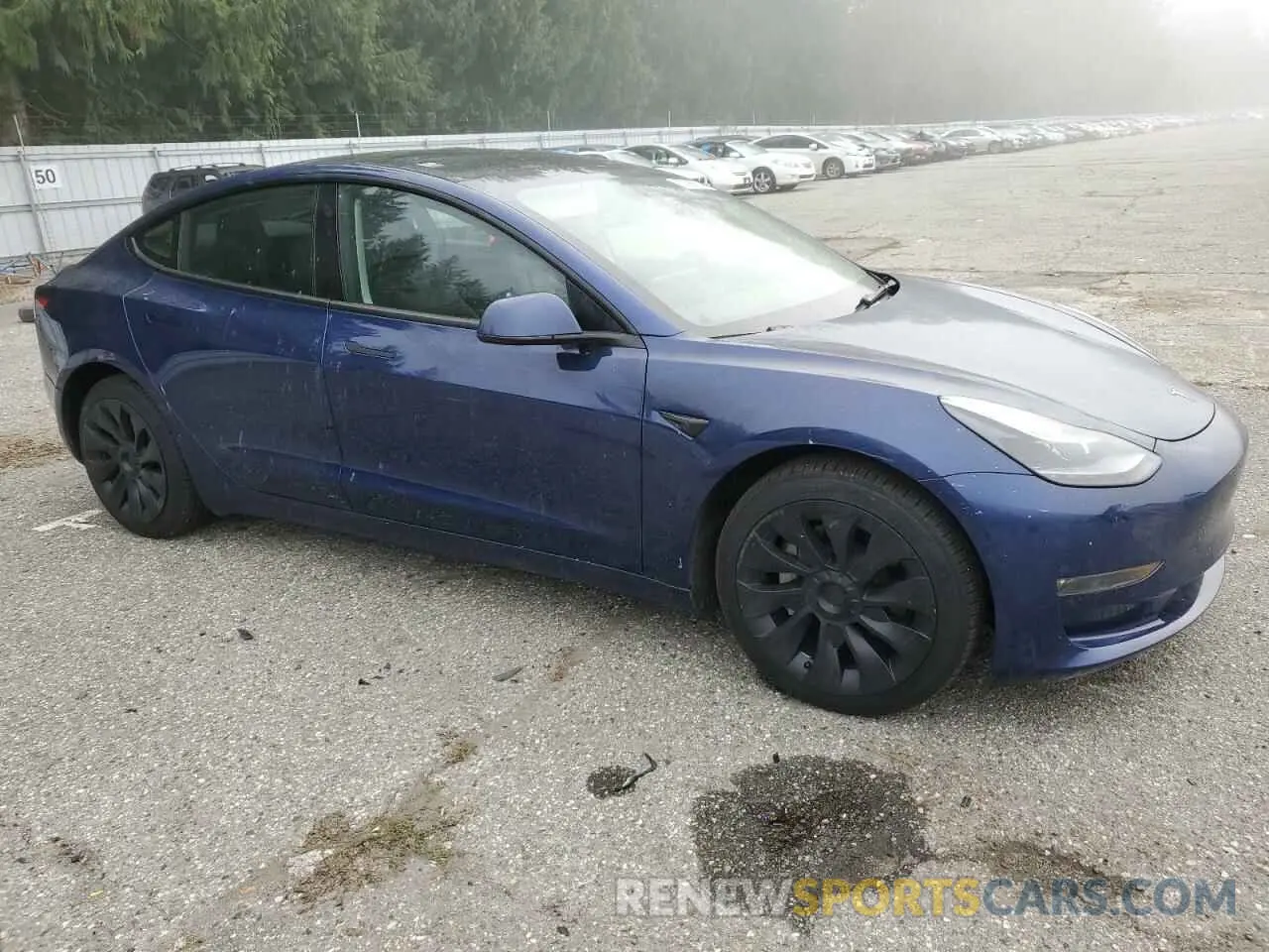 4 Photograph of a damaged car 5YJ3E1EB1NF179141 TESLA MODEL 3 2022