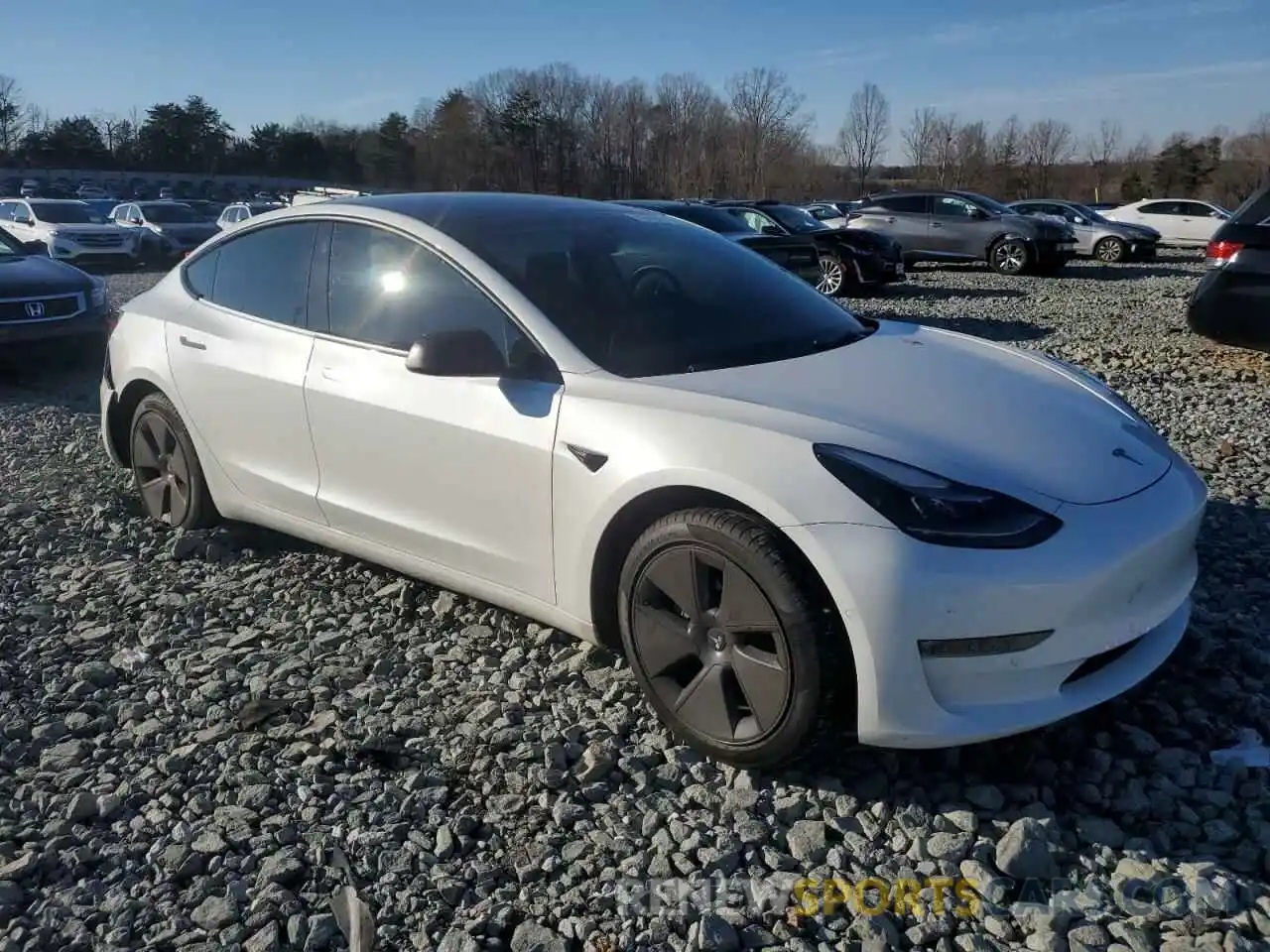 4 Photograph of a damaged car 5YJ3E1EB1NF183044 TESLA MODEL 3 2022