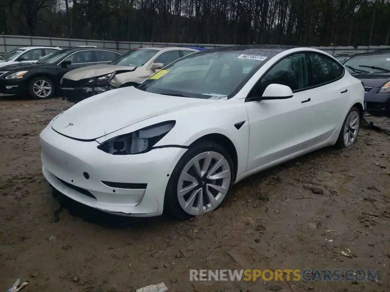 1 Photograph of a damaged car 5YJ3E1EB1NF185599 TESLA MODEL 3 2022