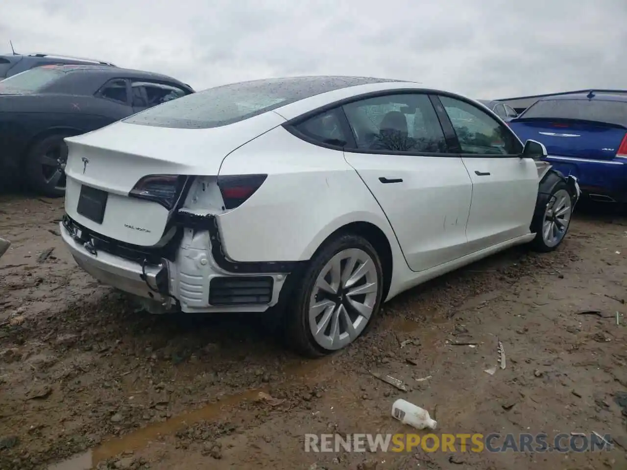 3 Photograph of a damaged car 5YJ3E1EB1NF185599 TESLA MODEL 3 2022