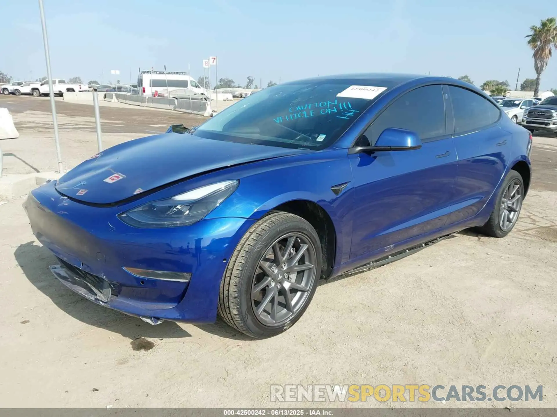 2 Photograph of a damaged car 5YJ3E1EB1NF189698 TESLA MODEL 3 2022