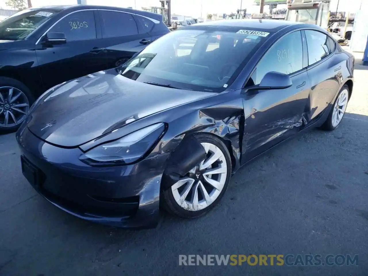 2 Photograph of a damaged car 5YJ3E1EB1NF192391 TESLA MODEL 3 2022