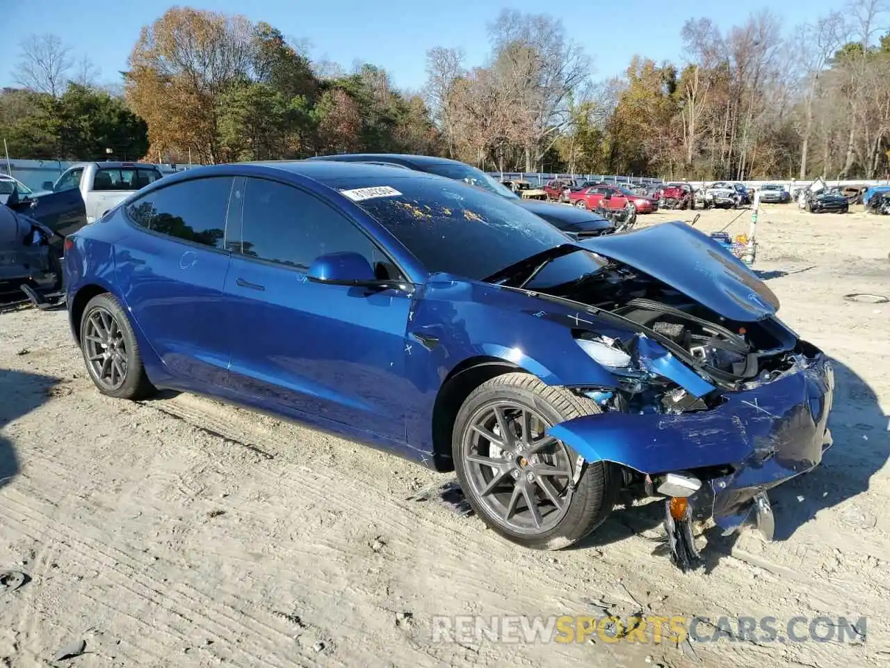 4 Photograph of a damaged car 5YJ3E1EB1NF207715 TESLA MODEL 3 2022