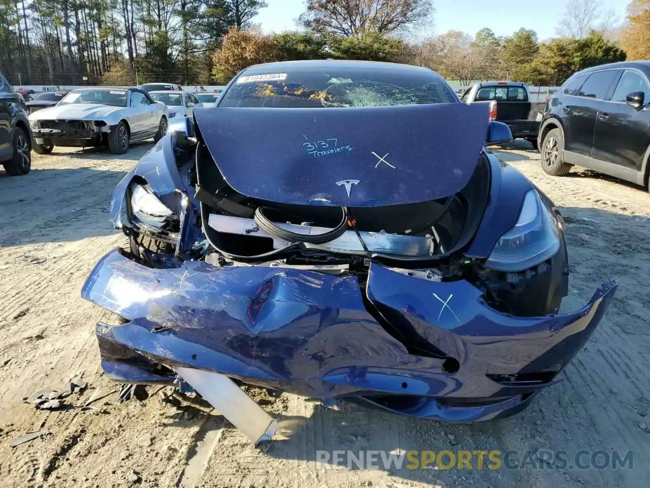 5 Photograph of a damaged car 5YJ3E1EB1NF207715 TESLA MODEL 3 2022