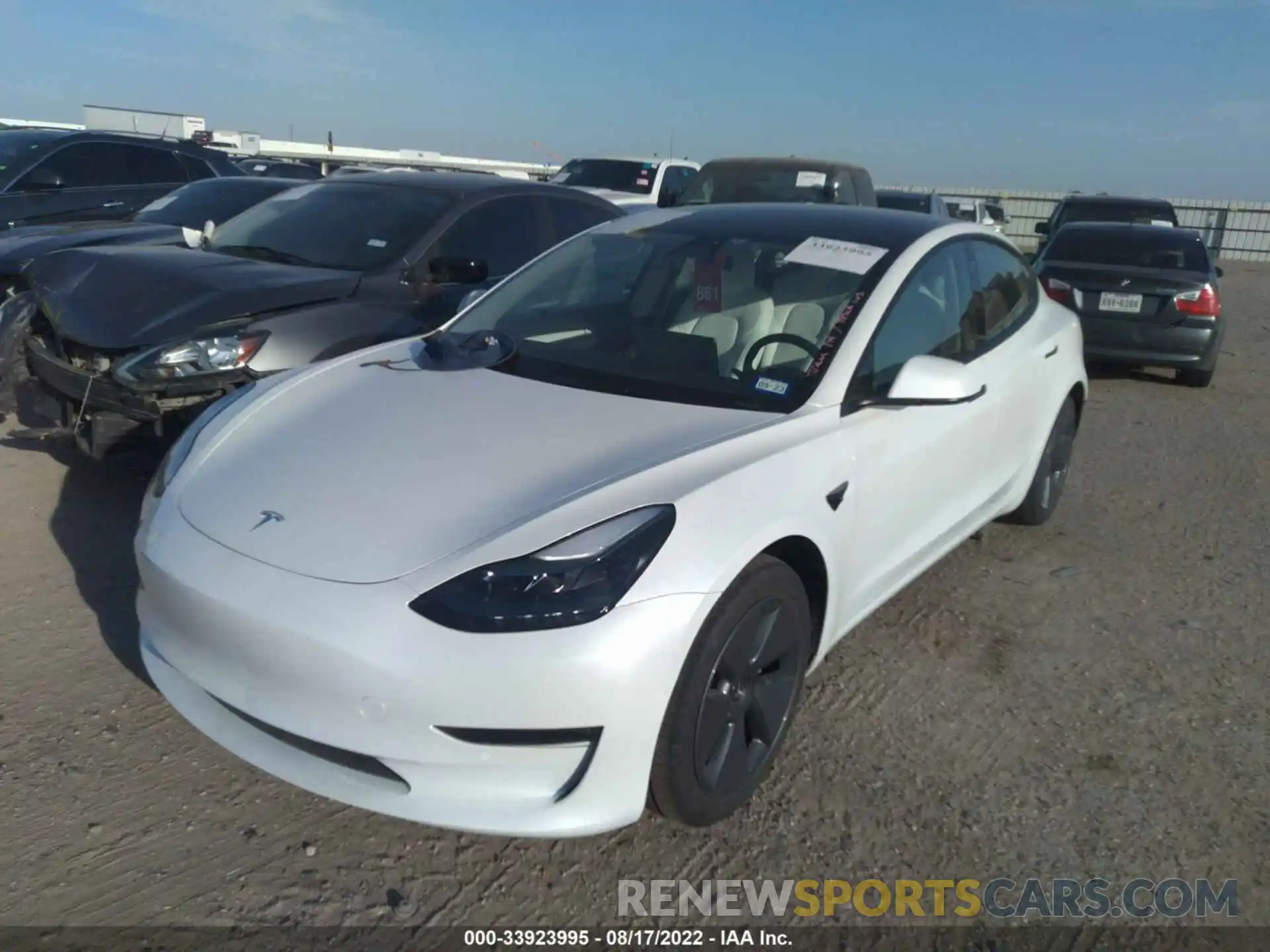 2 Photograph of a damaged car 5YJ3E1EB1NF232744 TESLA MODEL 3 2022