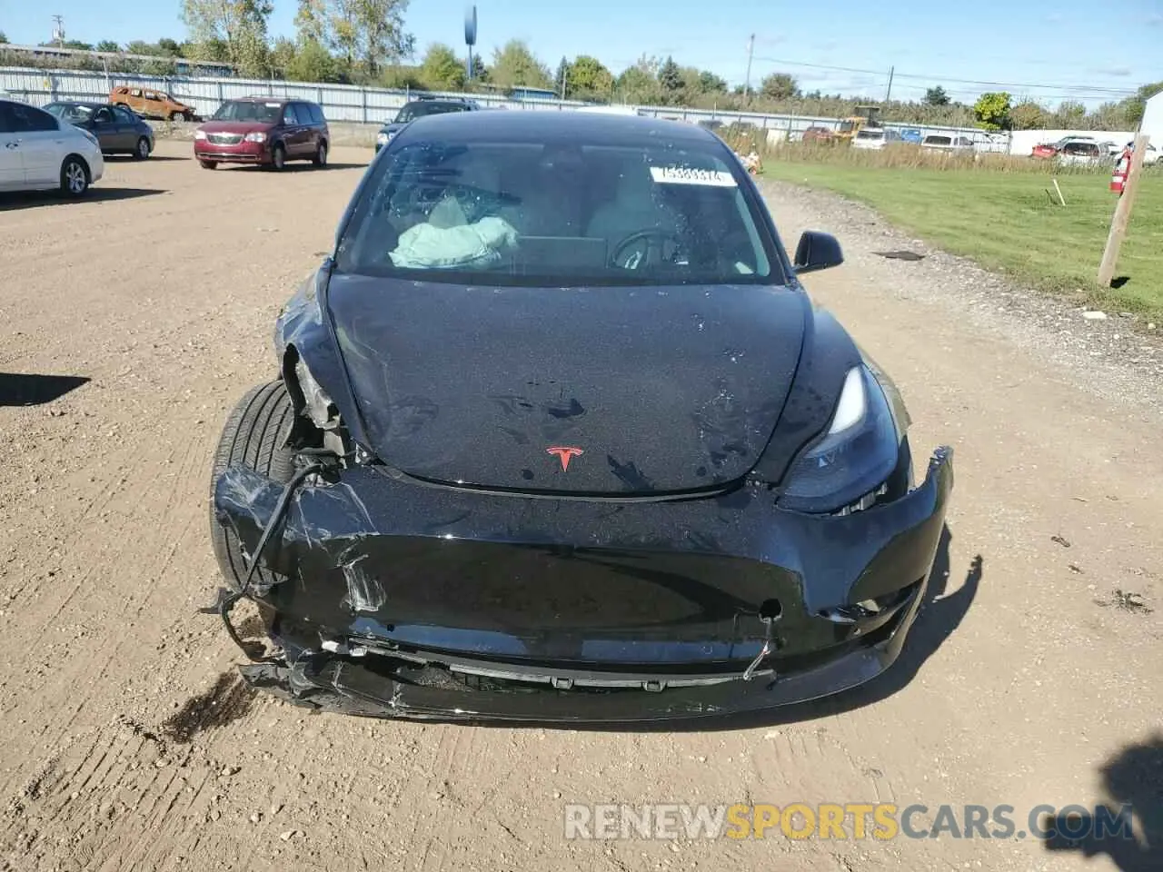 5 Photograph of a damaged car 5YJ3E1EB1NF233859 TESLA MODEL 3 2022