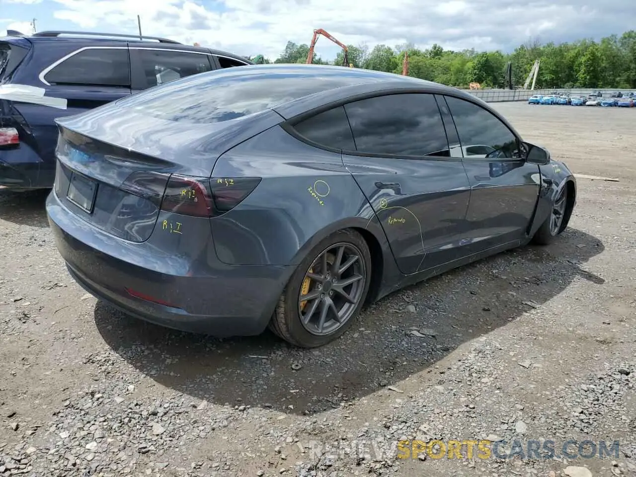 3 Photograph of a damaged car 5YJ3E1EB1NF238446 TESLA MODEL 3 2022