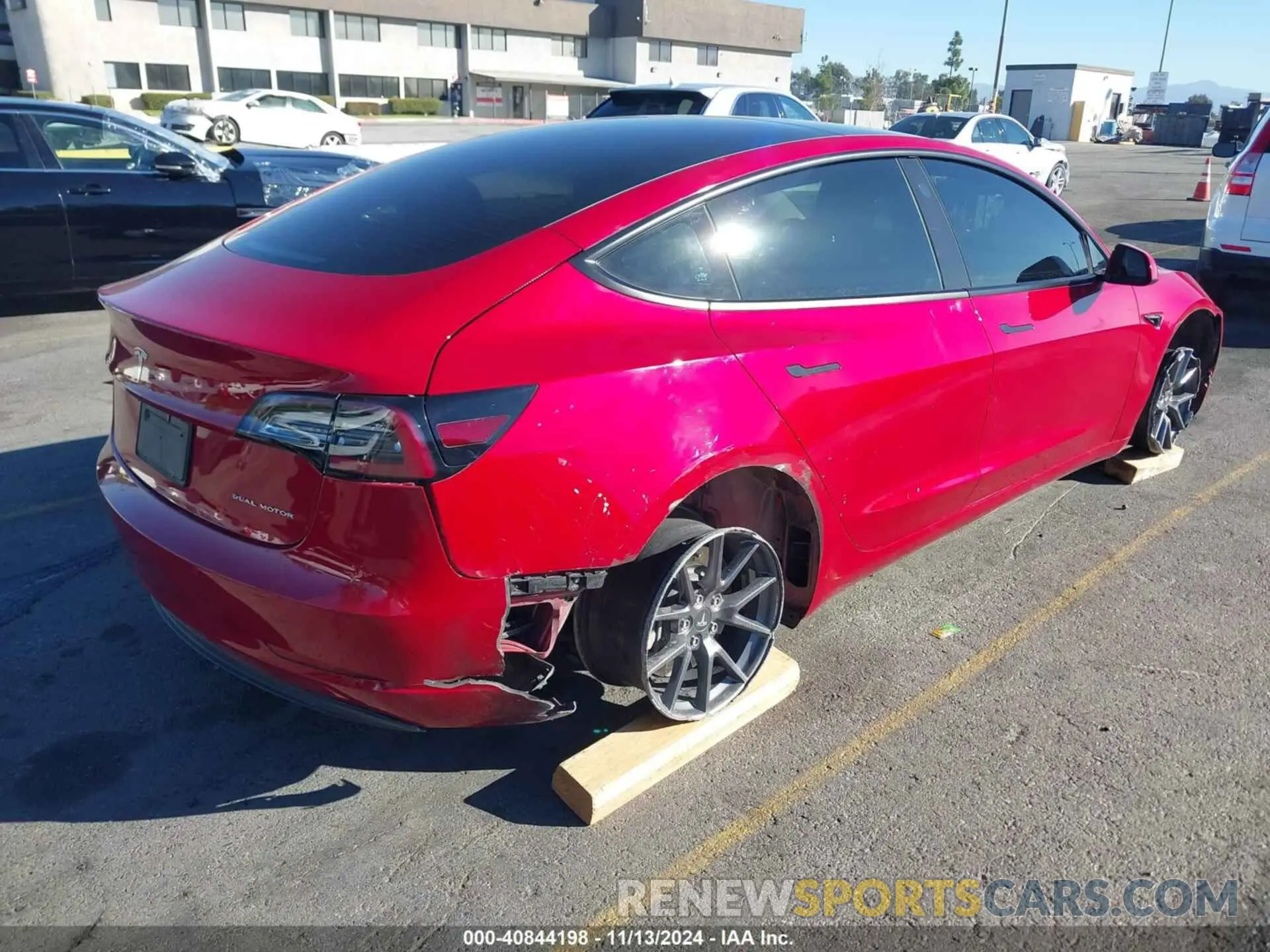 4 Photograph of a damaged car 5YJ3E1EB1NF249561 TESLA MODEL 3 2022