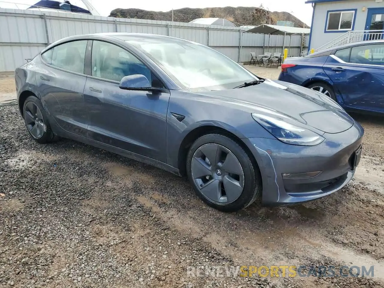4 Photograph of a damaged car 5YJ3E1EB1NF256882 TESLA MODEL 3 2022