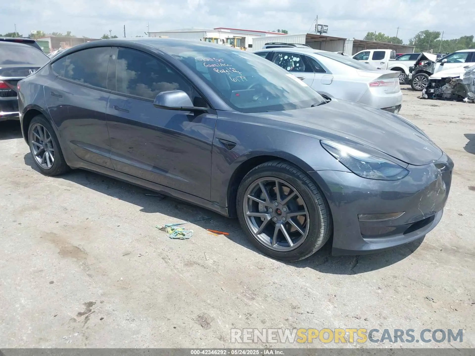 1 Photograph of a damaged car 5YJ3E1EB1NF266179 TESLA MODEL 3 2022
