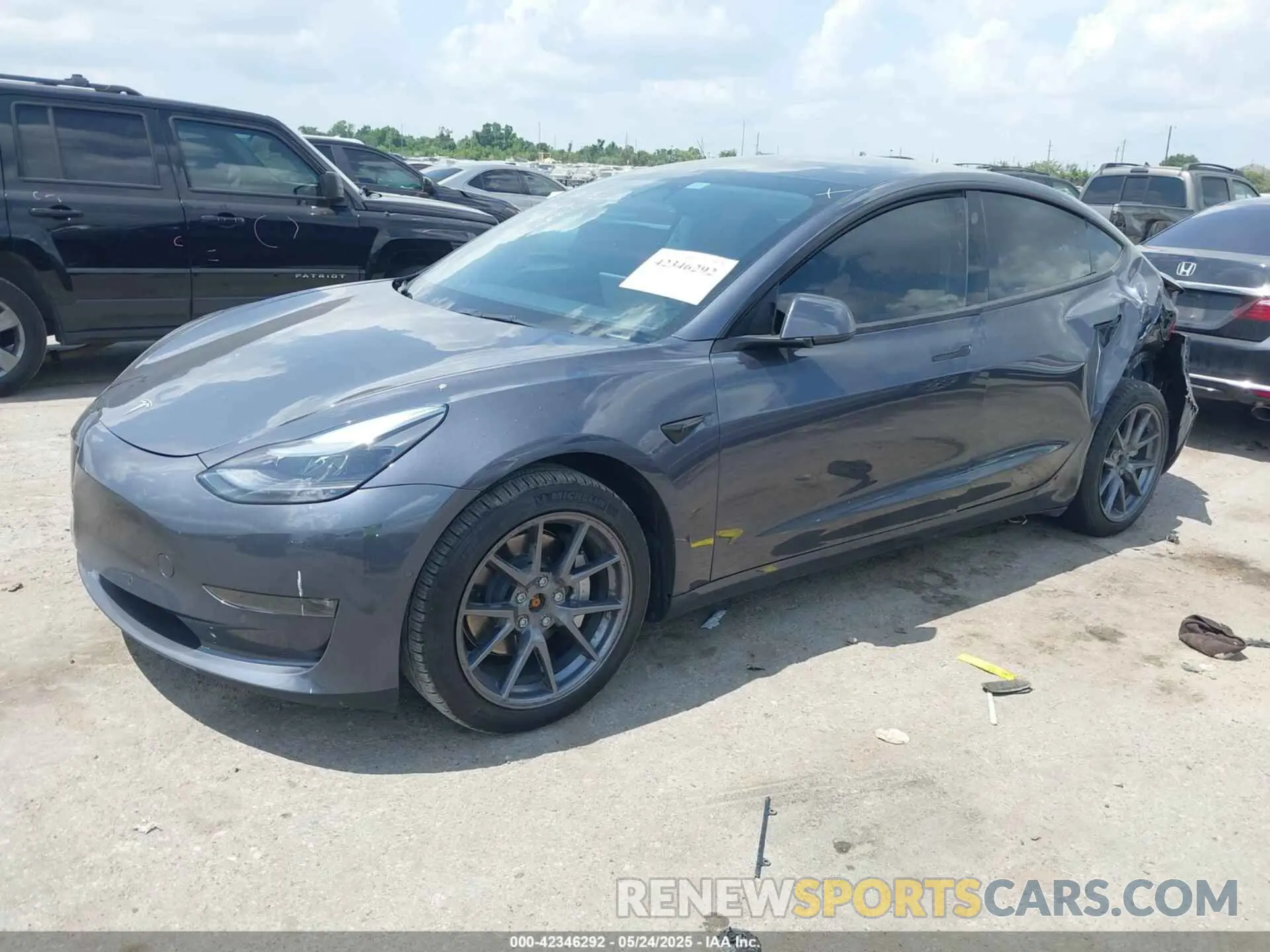 2 Photograph of a damaged car 5YJ3E1EB1NF266179 TESLA MODEL 3 2022